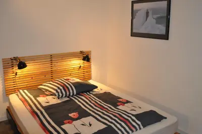 Ein Bett oder Betten in einem Zimmer der Unterkunft Appartement Hundackerweg