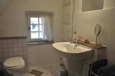 Ein Badezimmer in der Unterkunft Appartement Hundackerweg
