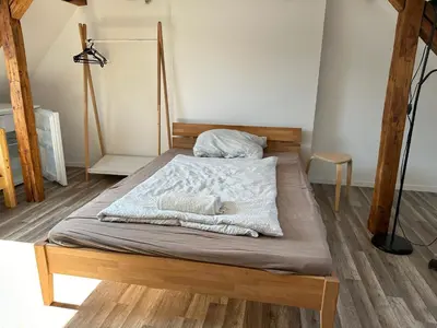 Ein Bett oder Betten in einem Zimmer der Unterkunft Ganzes Monteurhaus mit 4 Schlafzimmern für bis zu 8 Gäste