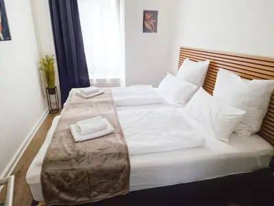 Ein Bett oder Betten in einem Zimmer der Unterkunft stayVision LS1 Wohnung 1 - 2 Schlafzimmer - 6 Gäste - top WLAN