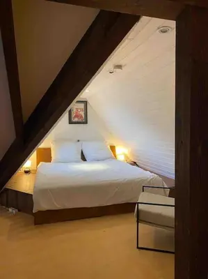 Ein Bett oder Betten in einem Zimmer der Unterkunft Loft in ruhiger Lage mit Blick ins Grüne
