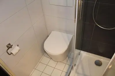 Ein Badezimmer in der Unterkunft M&M Park Hotel
