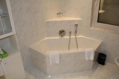 Ein Badezimmer in der Unterkunft M&M Park Hotel