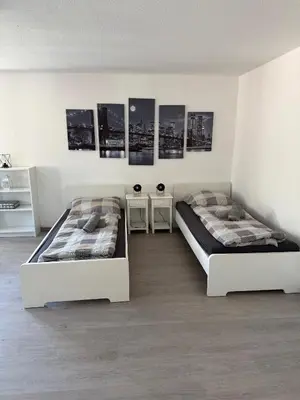 Ein Bett oder Betten in einem Zimmer der Unterkunft Wohnglück 3