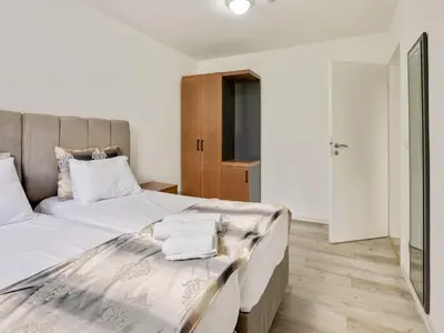 Ein Bett oder Betten in einem Zimmer der Unterkunft Oberhausen Urban Retreat