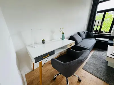 Ein Sitzbereich in der Unterkunft Neu und modern - 2 Schlafzimmer - Arbeitsplatz - Nespresso