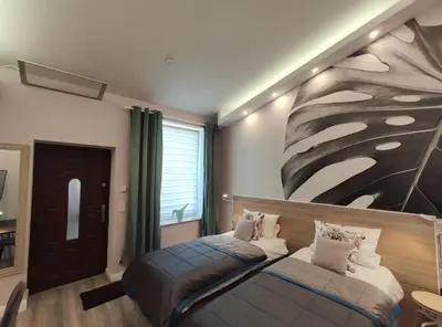 Ein Bett oder Betten in einem Zimmer der Unterkunft 3 Äpfel Design Apartments