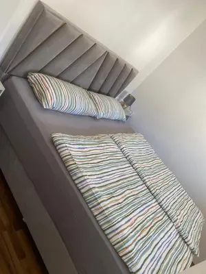 Ein Bett oder Betten in einem Zimmer der Unterkunft Downtown Residence Düsseldorf