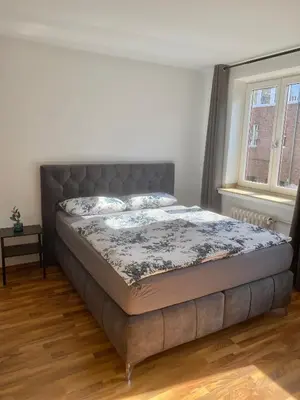 Ein Bett oder Betten in einem Zimmer der Unterkunft Downtown Residence Düsseldorf