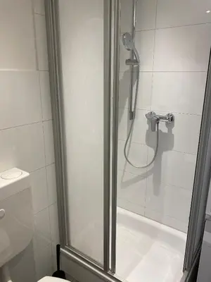 Ein Badezimmer in der Unterkunft Downtown Residence Düsseldorf