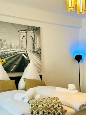 Ein Bett oder Betten in einem Zimmer der Unterkunft 99qm FeWo Uniklinikum-Essen