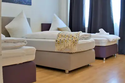 Ein Bett oder Betten in einem Zimmer der Unterkunft 99qm FeWo Uniklinikum-Essen