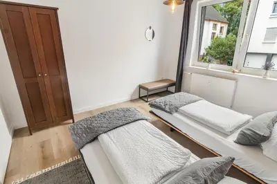 Ein Bett oder Betten in einem Zimmer der Unterkunft NEU Ruhige und gemütliche Wohnung mit Balkon