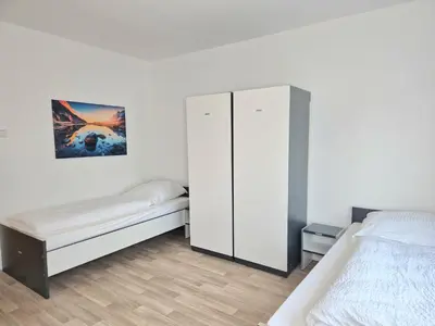 Ein Bett oder Betten in einem Zimmer der Unterkunft Meribu W18-20 Wohnung für Monteure und Arbeiter