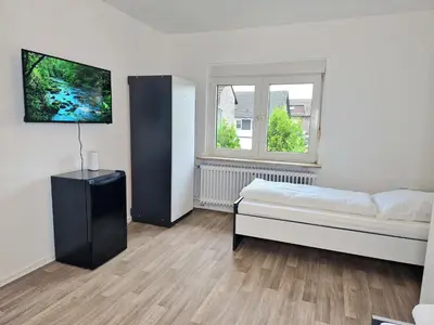 Ein Bett oder Betten in einem Zimmer der Unterkunft Meribu W18-20 Wohnung für Monteure und Arbeiter