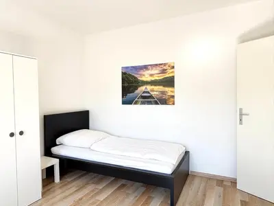 Ein Bett oder Betten in einem Zimmer der Unterkunft Meribu W18-20 Wohnung für Monteure und Arbeiter