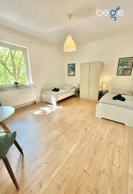 Ein Bett oder Betten in einem Zimmer der Unterkunft BEGE APARTMENTS WorkStay Lodge
