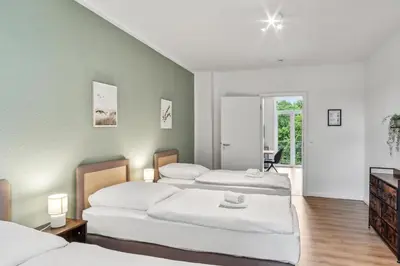 Ein Bett oder Betten in einem Zimmer der Unterkunft Sali Homes Apartmenthaus Bochum