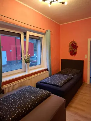 Ein Bett oder Betten in einem Zimmer der Unterkunft B&B Apartments Privater Eingang und kostenlose Parkplatz