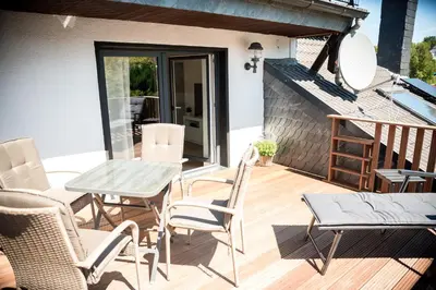 Ein Balkon oder eine Terrasse in der Unterkunft Terrassenwohnung mit Gartenblick