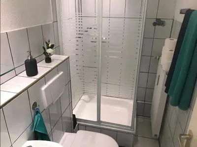 Ein Badezimmer in der Unterkunft Apartment, parterre, für 3 Gäste, Zentral gelegen, Mitsubishi Halle