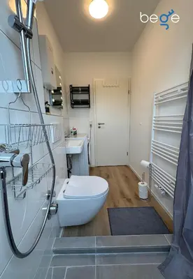 Ein Badezimmer in der Unterkunft BEGE APARTMENTS Company Retreat