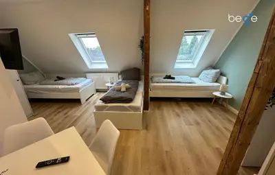 Ein Bett oder Betten in einem Zimmer der Unterkunft BEGE APARTMENTS Company Retreat
