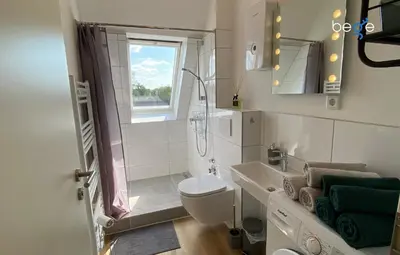 Ein Badezimmer in der Unterkunft BEGE APARTMENTS Company Retreat