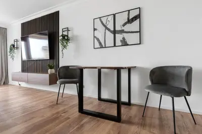 Ein Sitzbereich in der Unterkunft Beyond Living - Apartment Zentral