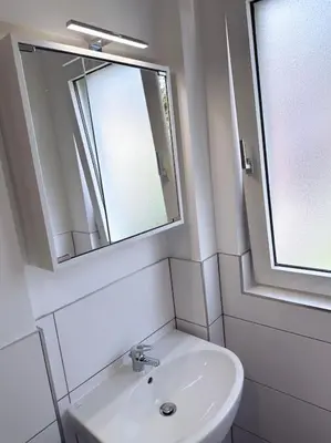 Ein Badezimmer in der Unterkunft City Apartment with WIFI, Kitchen and 4K TV