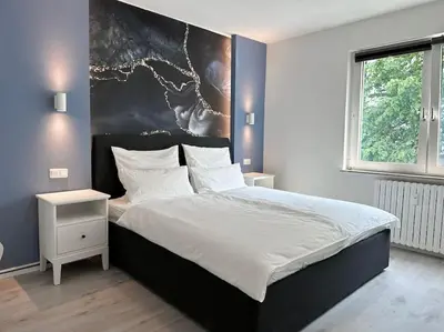 Ein Bett oder Betten in einem Zimmer der Unterkunft City Apartment with WIFI, Kitchen and 4K TV