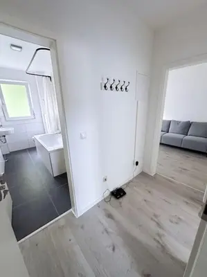 Ein Sitzbereich in der Unterkunft City Apartment with WIFI, Kitchen and 4K TV