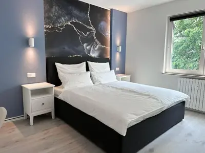 Ein Bett oder Betten in einem Zimmer der Unterkunft City Apartment with WIFI, Kitchen and 4K TV