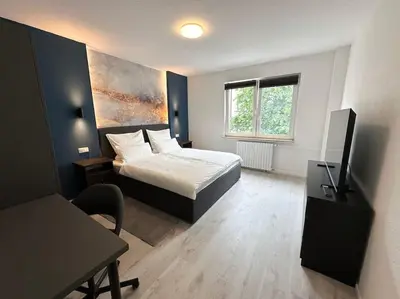 TV/Unterhaltungsangebot in der Unterkunft City Apartment with WIFI, Kitchen and 4K TV