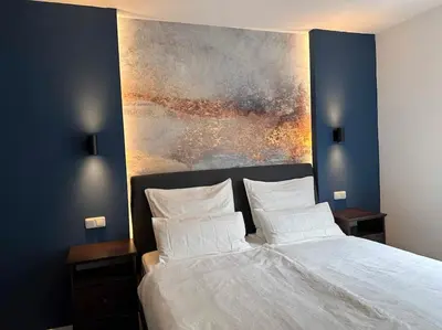 Ein Bett oder Betten in einem Zimmer der Unterkunft City Apartment with WIFI, Kitchen and 4K TV