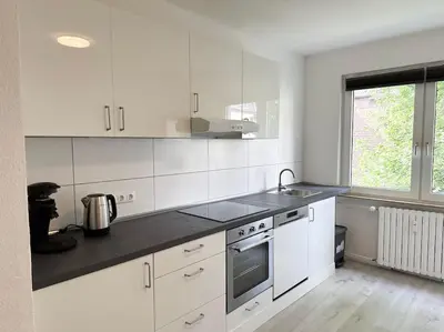 Küche/Küchenzeile in der Unterkunft City Apartment with WIFI, Kitchen and 4K TV