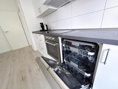 Küche/Küchenzeile in der Unterkunft City Apartment with WIFI, Kitchen and 4K TV
