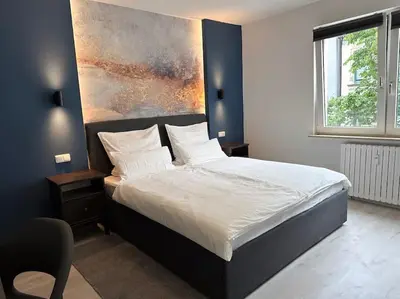 Ein Bett oder Betten in einem Zimmer der Unterkunft City Apartment with WIFI, Kitchen and 4K TV