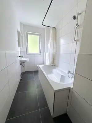 Ein Badezimmer in der Unterkunft City Apartment with WIFI, Kitchen and 4K TV