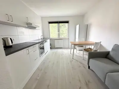 Küche/Küchenzeile in der Unterkunft City Apartment with WIFI, Kitchen and 4K TV
