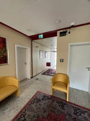 Ein Sitzbereich in der Unterkunft Hotel Herzog