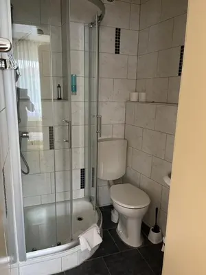 Ein Badezimmer in der Unterkunft Hotel Herzog