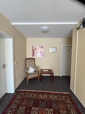 Ein Sitzbereich in der Unterkunft Hotel Herzog