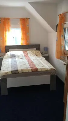 Ein Bett oder Betten in einem Zimmer der Unterkunft Ferienhaus Pacco