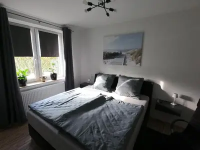 Ein Bett oder Betten in einem Zimmer der Unterkunft Pension Zollverein