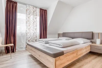 Ein Bett oder Betten in einem Zimmer der Unterkunft Ferienwohnung Gutmensch