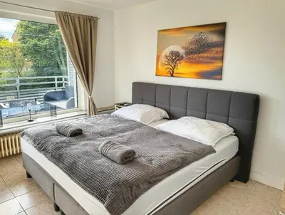 Ein Bett oder Betten in einem Zimmer der Unterkunft 3 Zimmer Apartment mit Balkon