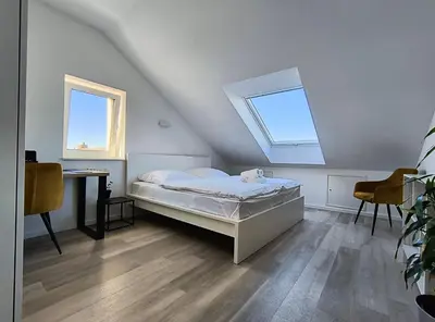 Ein Bett oder Betten in einem Zimmer der Unterkunft Modernes Apartment Melia