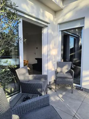 Ein Sitzbereich in der Unterkunft Modernes Apartment Melia