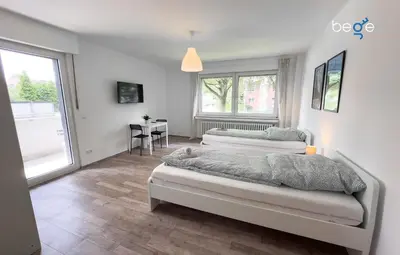 Ein Bett oder Betten in einem Zimmer der Unterkunft BEGE APARTMENTS Corporate Lodge